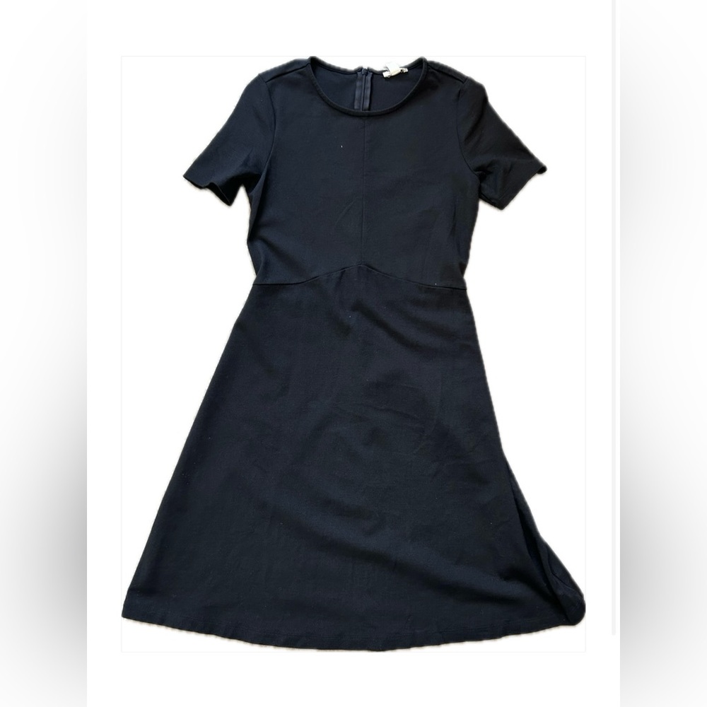 Black knee-length dress in perfect condition